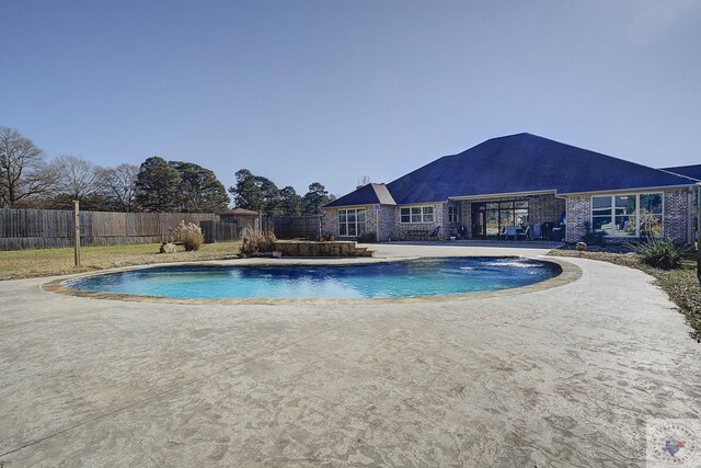 view of pool featuring a patio area