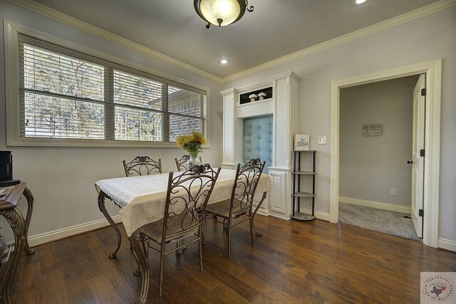 dining room featuring crown molding and dark wood-type flooring