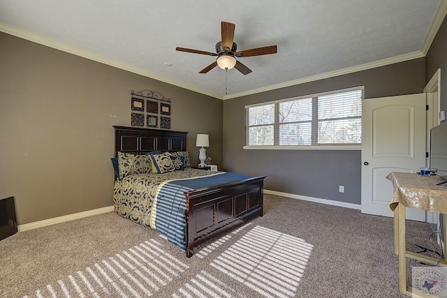 carpeted bedroom featuring ceiling fan and crown molding