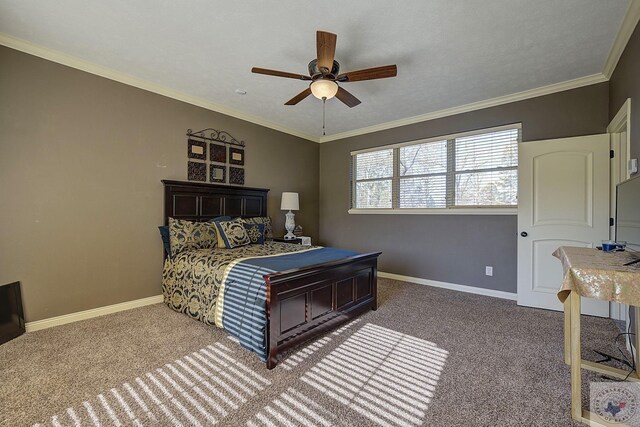 carpeted bedroom featuring ceiling fan and crown molding