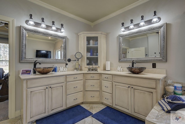 bathroom featuring tile patterned floors, vanity, and ornamental molding