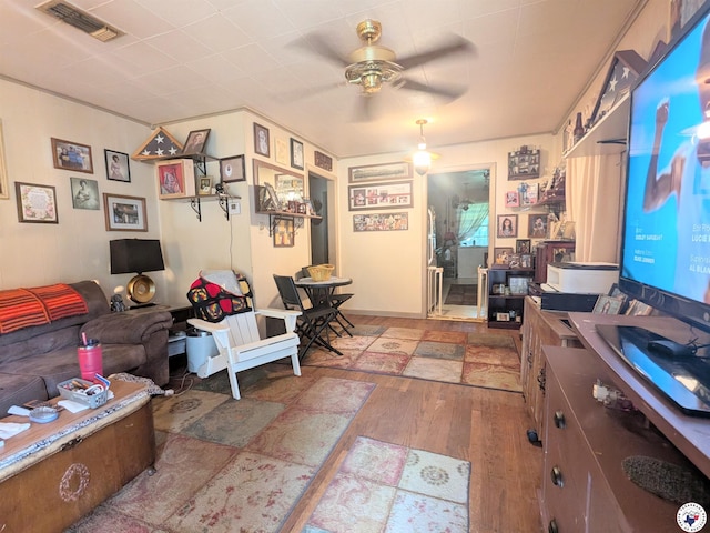 3319 Rhozine Ln, Texarkana, TX 75503 - living room featuring wood finished floors and a ceiling fan
