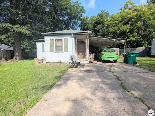 3319 Rhozine Ln, Texarkana, TX 75503 - view of front facade with driveway and an attached carport
