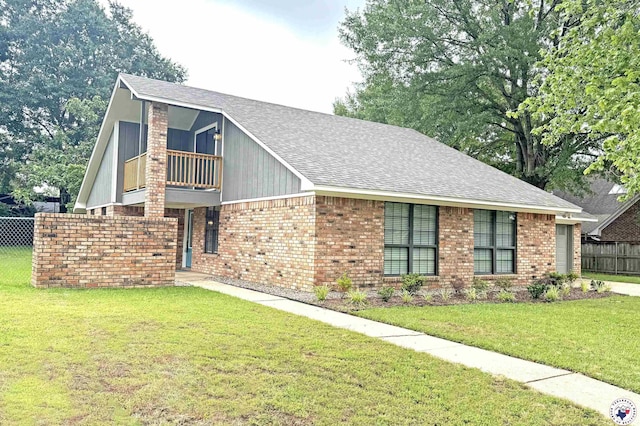 403 Edgewood Ln, Wake Village, TX 75501 - view of front of house featuring a balcony, brick siding, and roof with shingles