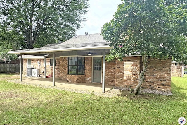 403 Edgewood Ln, Wake Village, TX 75501 - rear view of property with a patio, brick siding, and a shingled roof