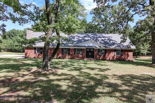 ranch-style house with a front yard