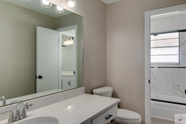 full bathroom with vanity, toilet, and shower / bath combination