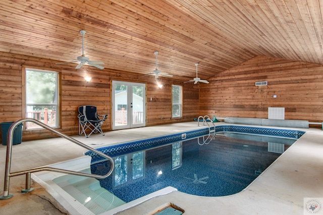 view of pool featuring a hot tub and french doors