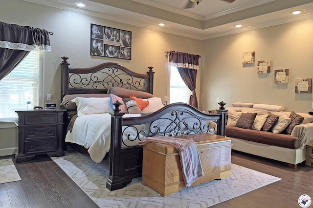 220 Quail Trl, Texarkana, TX 75501 - bedroom with recessed lighting, crown molding, a tray ceiling, and wood-type flooring