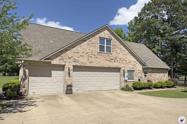 220 Quail Trl, Texarkana, TX 75501 - view of front facade with roof with shingles, brick siding, and driveway