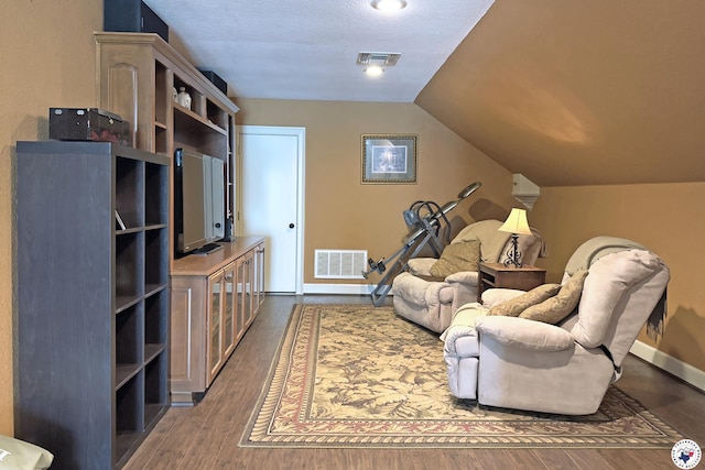 220 Quail Trl, Texarkana, TX 75501 - living room with visible vents and dark wood-type flooring