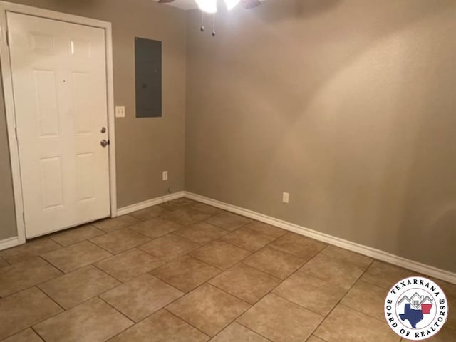 2415-2417 Laurel, Texarkana, AR 71854 - foyer with electric panel, ceiling fan, baseboards, and light tile patterned floors