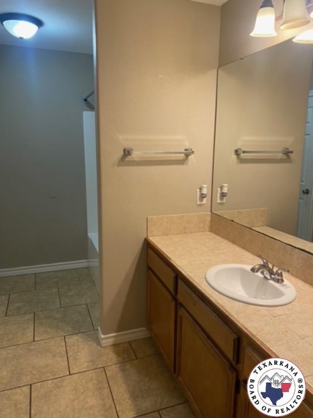 2415-2417 Laurel, Texarkana, AR 71854 - bathroom featuring vanity, baseboards, shower / bath combination, and tile patterned flooring
