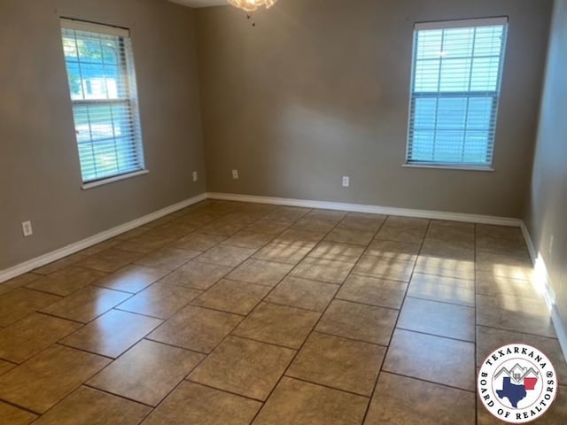 2415-2417 Laurel, Texarkana, AR 71854 - tiled empty room featuring baseboards