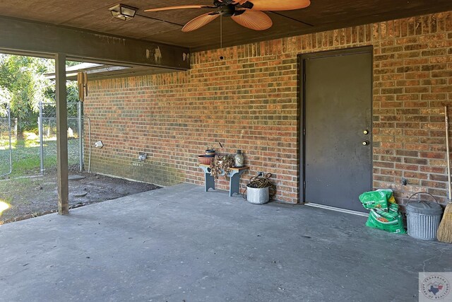 view of patio featuring ceiling fan