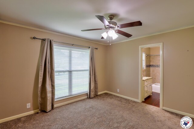 4101 Columbia Ave, Texarkana, TX 75503 - unfurnished bedroom featuring carpet floors, multiple windows, crown molding, baseboards, and connected bathroom