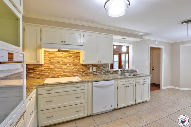 4101 Columbia Ave, Texarkana, TX 75503 - kitchen featuring white appliances, a sink, tasteful backsplash, ornamental molding, and light tile patterned floors