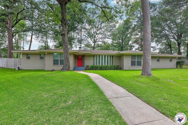 4101 Columbia Ave, Texarkana, TX 75503 - ranch-style house featuring stucco siding and a chimney