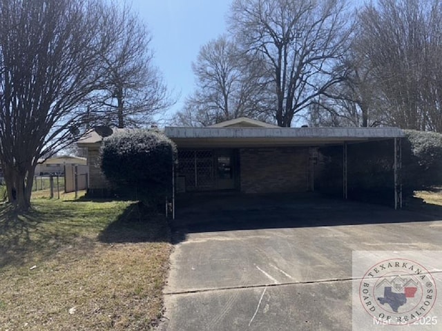 exterior space featuring concrete driveway