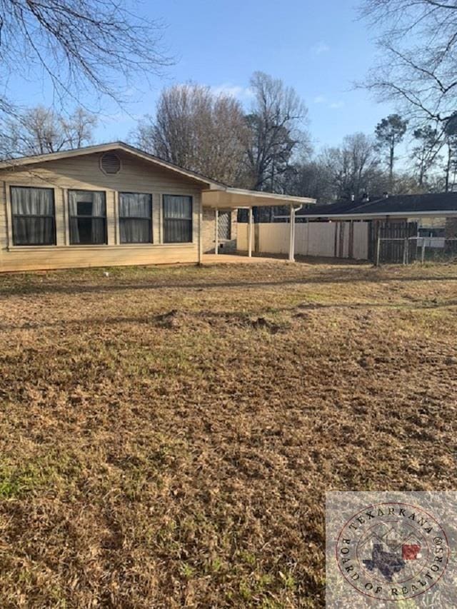 exterior space featuring fence