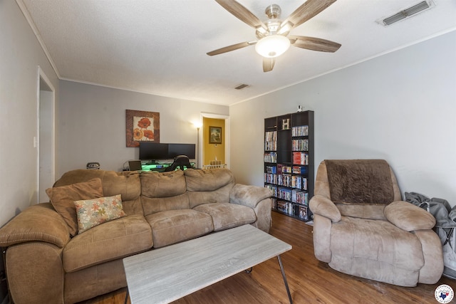 1324 Linden Ave, Texarkana, AR 71854 - living room with wood finished floors, ceiling fan, ornamental molding, and a desk