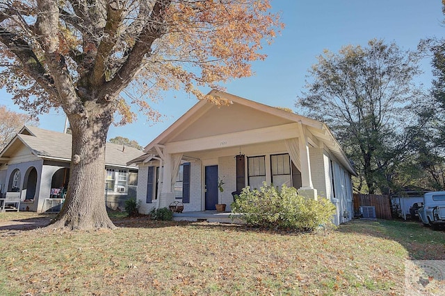 view of front of house with a front lawn and a porch