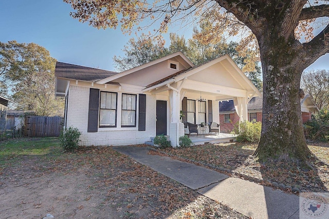 bungalow featuring covered porch