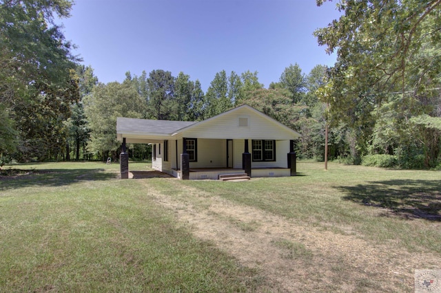 ranch-style home featuring a porch and a front lawn