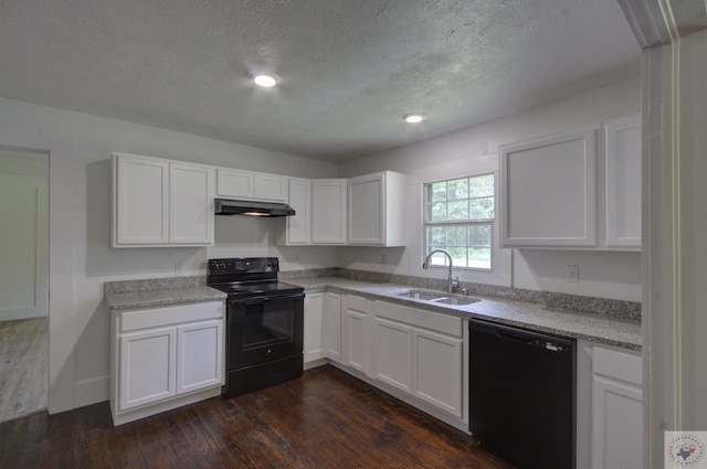 kitchen with black appliances, a textured ceiling, white cabinetry, sink, and dark hardwood / wood-style flooring