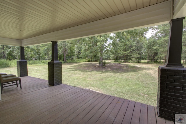 deck featuring a yard