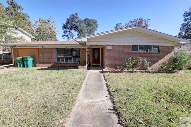 single story home with a front lawn