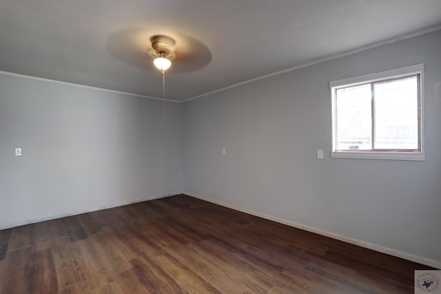 unfurnished room with ceiling fan, crown molding, and dark hardwood / wood-style floors