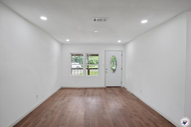 121 Circle Dr, Bogata, TX 75417 - foyer entrance featuring wood finished floors and recessed lighting