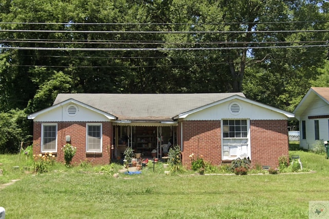 view of front of property with a front lawn