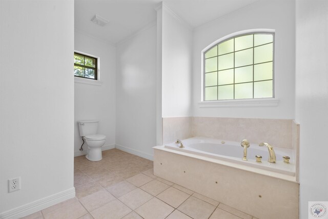 full bath with visible vents, toilet, tile patterned floors, a garden tub, and crown molding