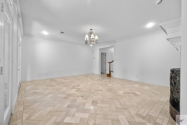 unfurnished living room with an inviting chandelier, light parquet flooring, and ornamental molding