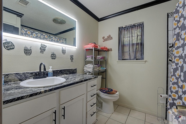 bathroom with crown molding, tile patterned floors, toilet, a textured ceiling, and vanity