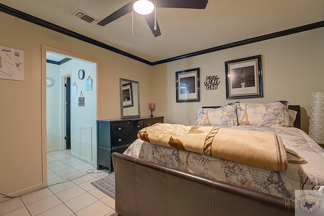 bedroom with ceiling fan, light tile patterned floors, and ornamental molding