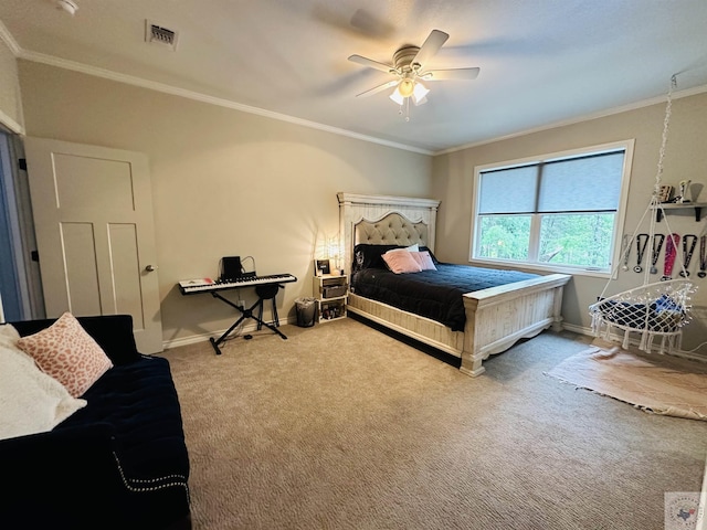 bedroom with visible vents, carpet floors, baseboards, and crown molding