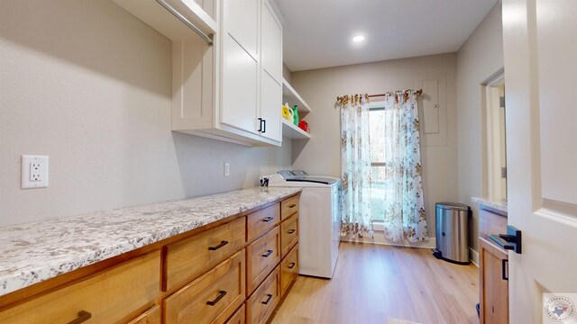 laundry room featuring washer / clothes dryer, light wood finished floors, and recessed lighting