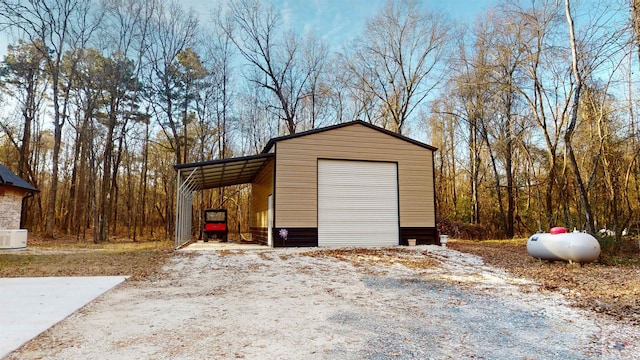 garage with a carport