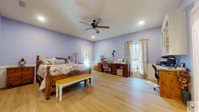 bedroom with light wood-type flooring and ceiling fan