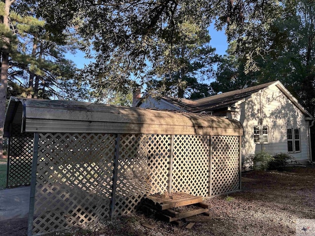 exterior space featuring a carport