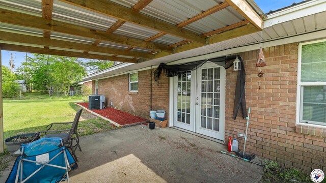 view of patio / terrace with central air condition unit and french doors