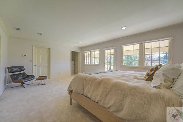 bedroom featuring light carpet and ornamental molding