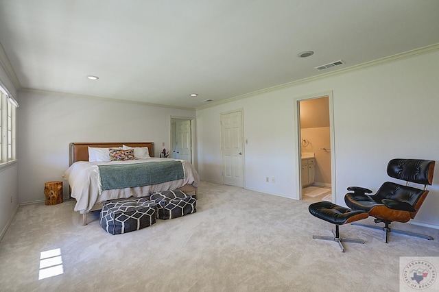 carpeted bedroom featuring crown molding and connected bathroom