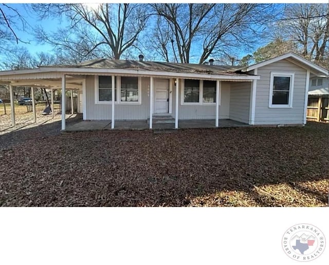 view of front of house featuring a carport