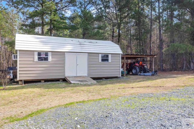 view of shed with driveway