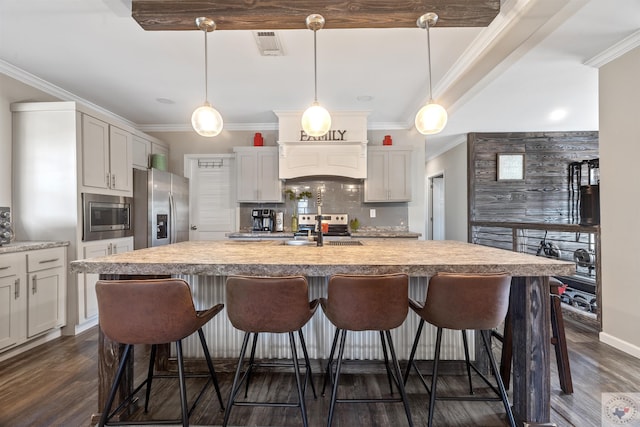 kitchen with stainless steel appliances, decorative backsplash, dark wood-type flooring, ornamental molding, and a sink