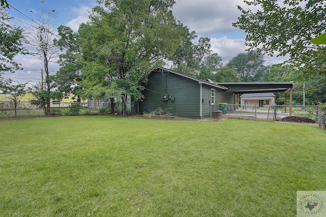 view of yard featuring a carport